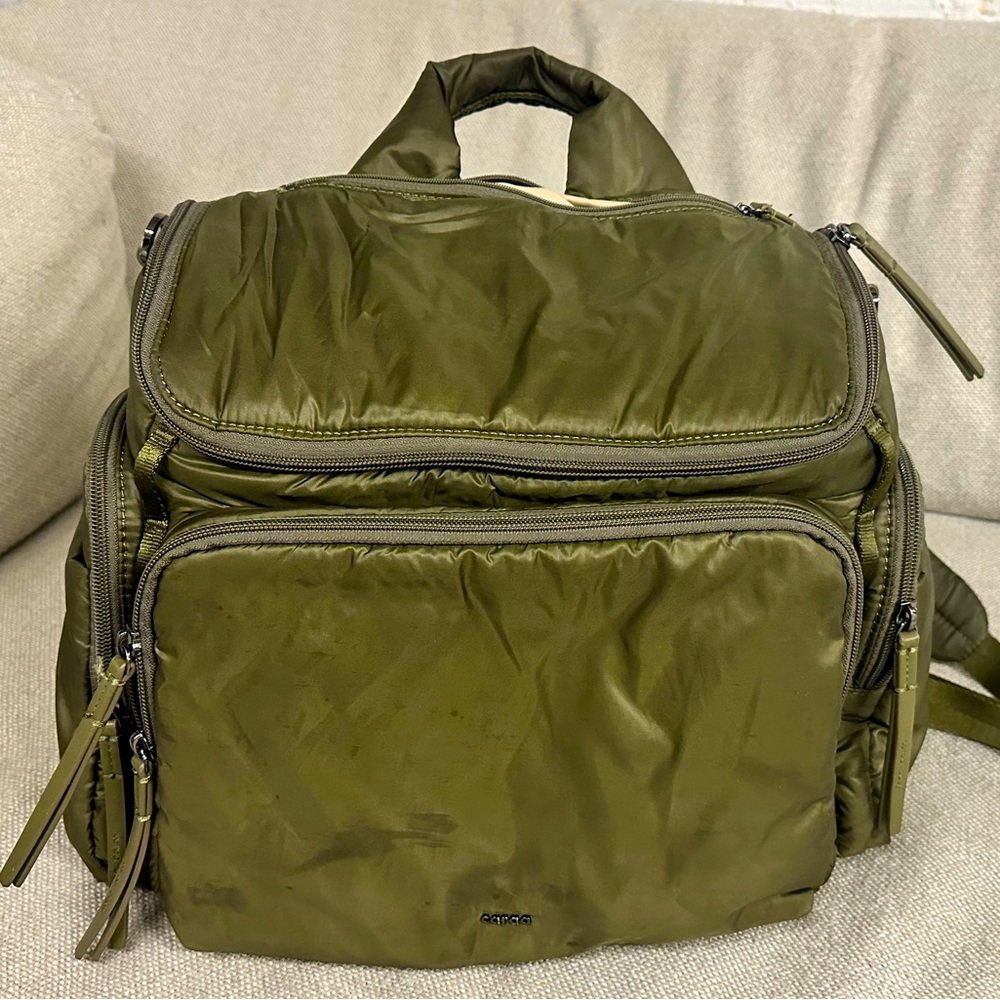 Green medium Caraa Baby Bag, lightly used but some water stains on outside
